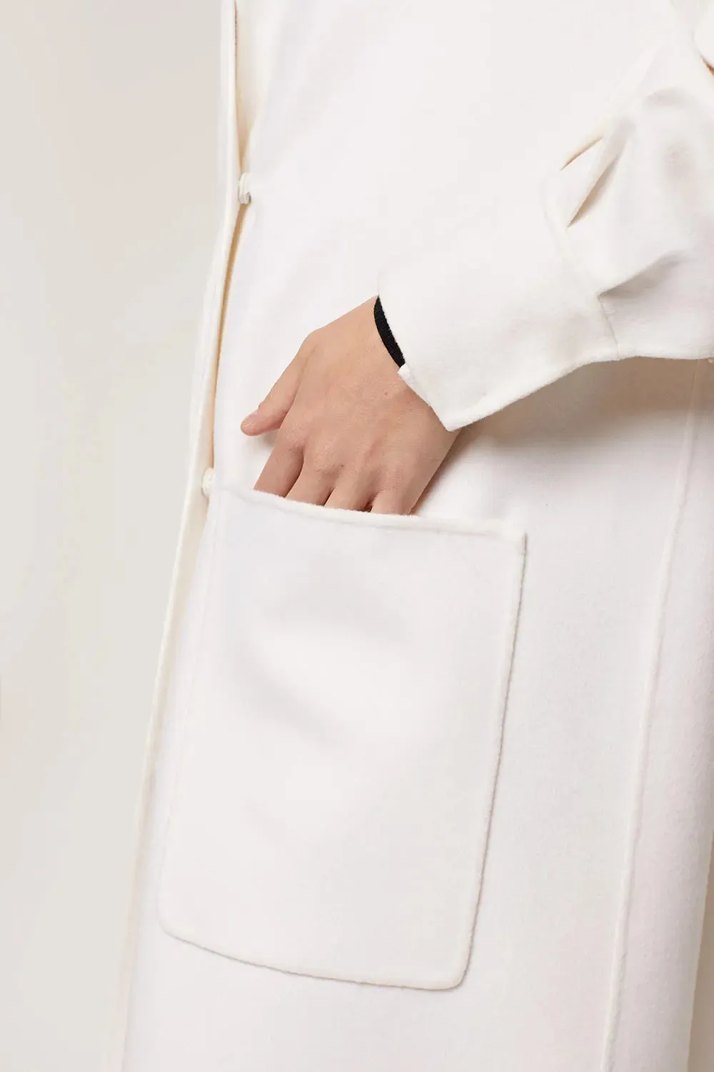 Long white cashmere coat